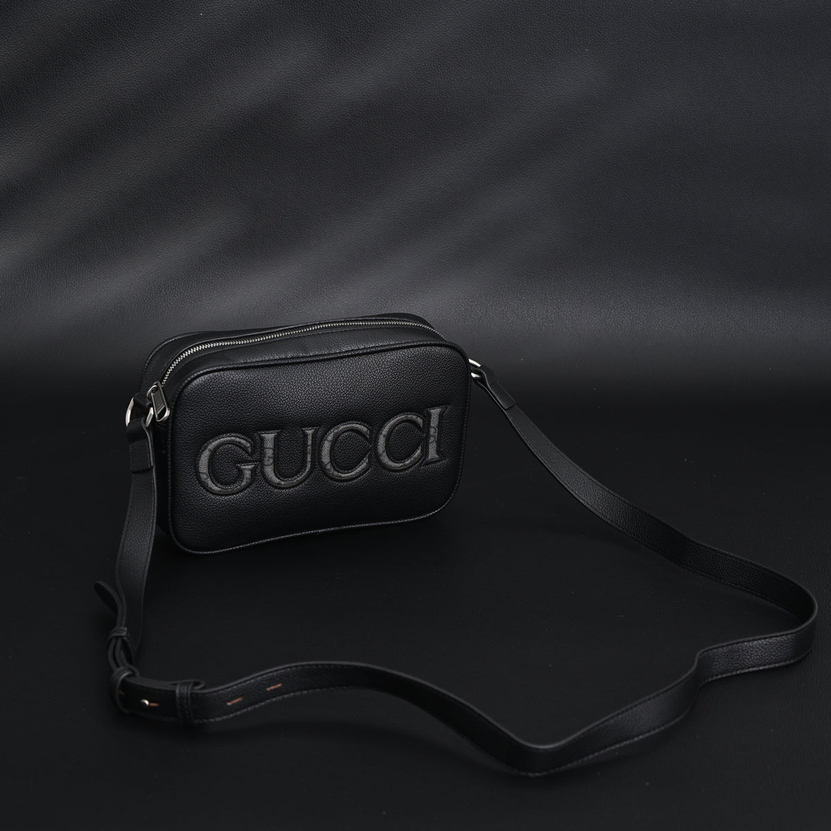 Gucci Black Leather Embossed Logo Belt Bag product image 2, provided for visual reference and product detail review