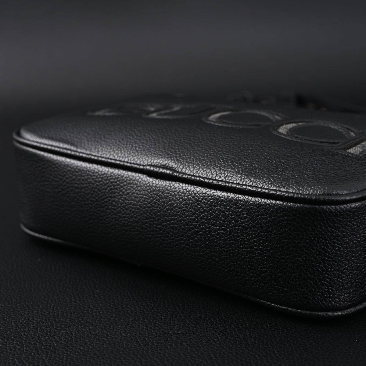 Gucci Black Leather Embossed Logo Belt Bag product image 8, provided for visual reference and product detail review