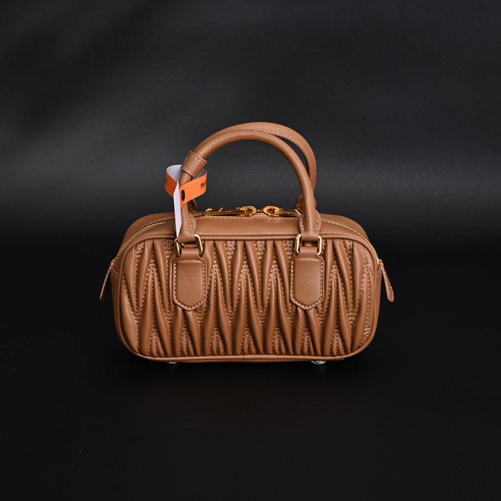 Miu Miu Matelassé Leather Top Handle Bag – Caramel Brown product image 9, provided for visual reference and product detail