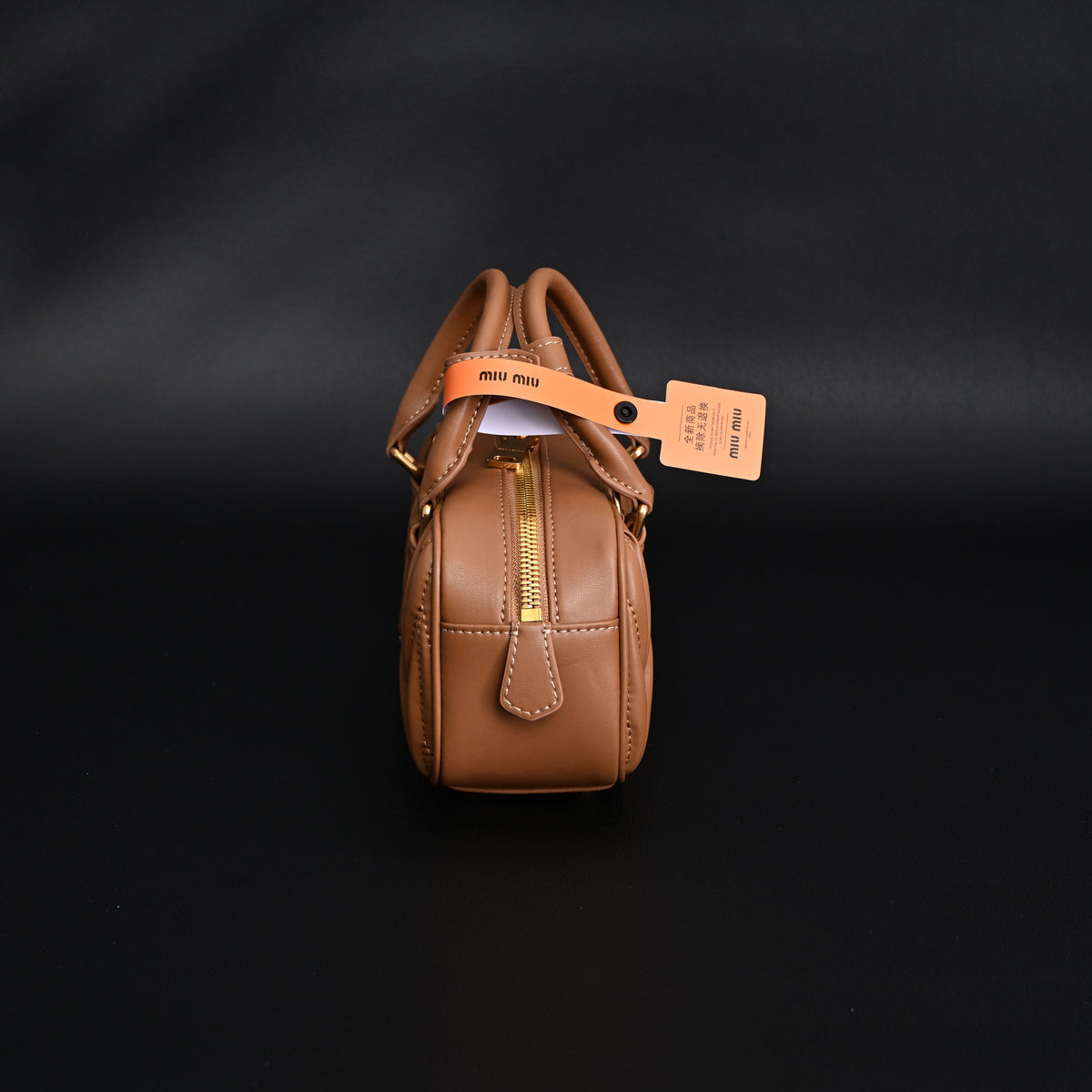 Miu Miu Matelassé Leather Top Handle Bag – Caramel Brown product image 10, provided for visual reference and product detail
