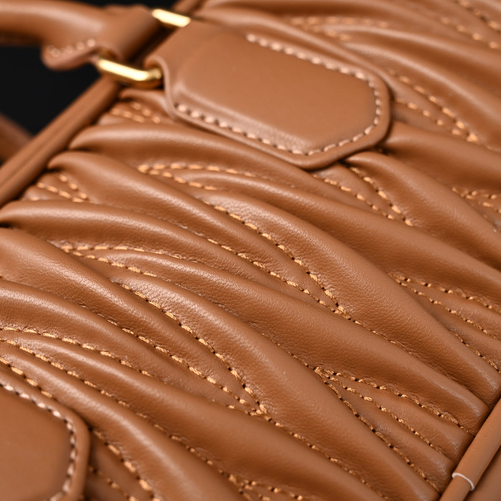 Miu Miu Matelassé Leather Top Handle Bag – Caramel Brown product image 16, provided for visual reference and product detail