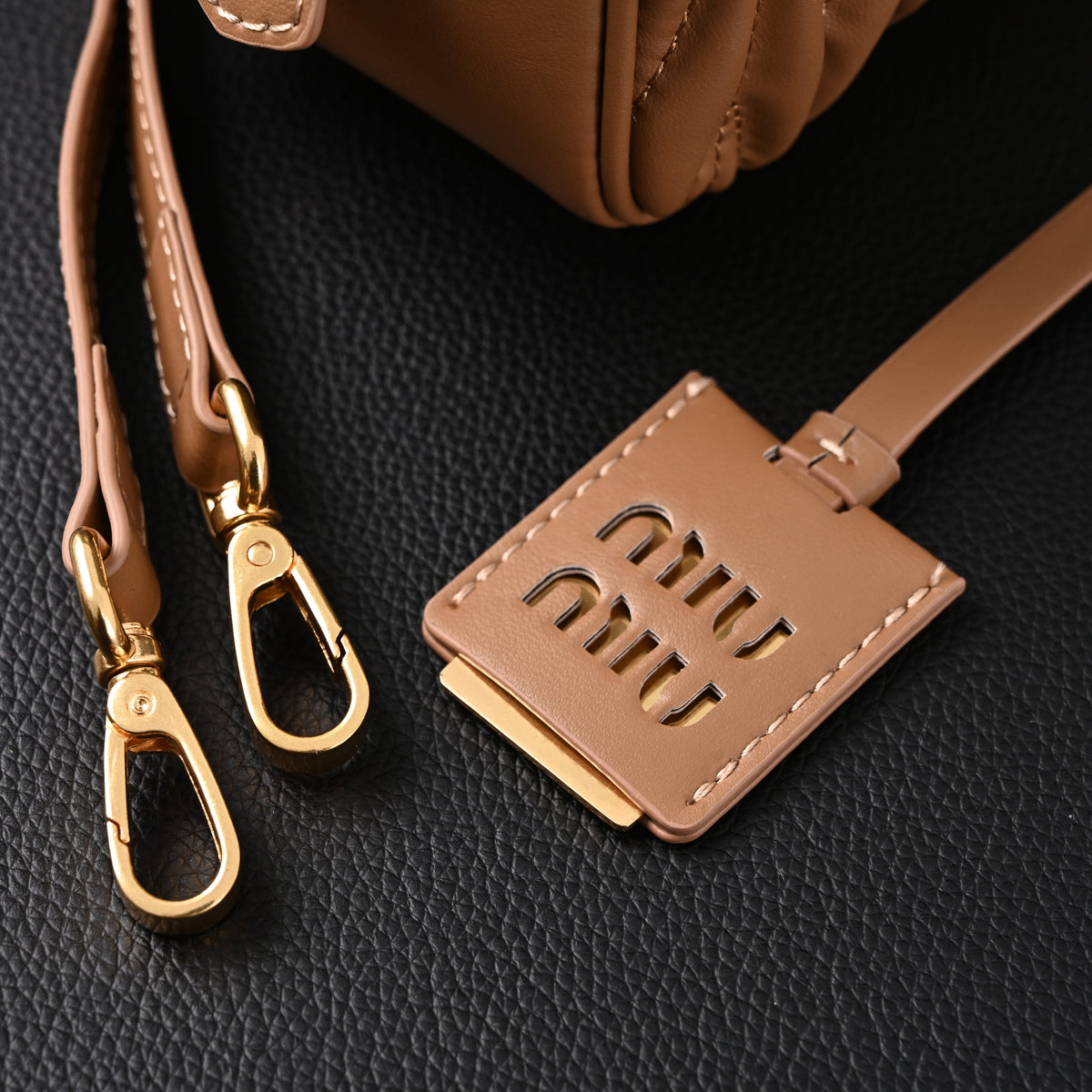Miu Miu Matelassé Leather Top Handle Bag – Caramel Brown product image 4, provided for visual reference and product detail