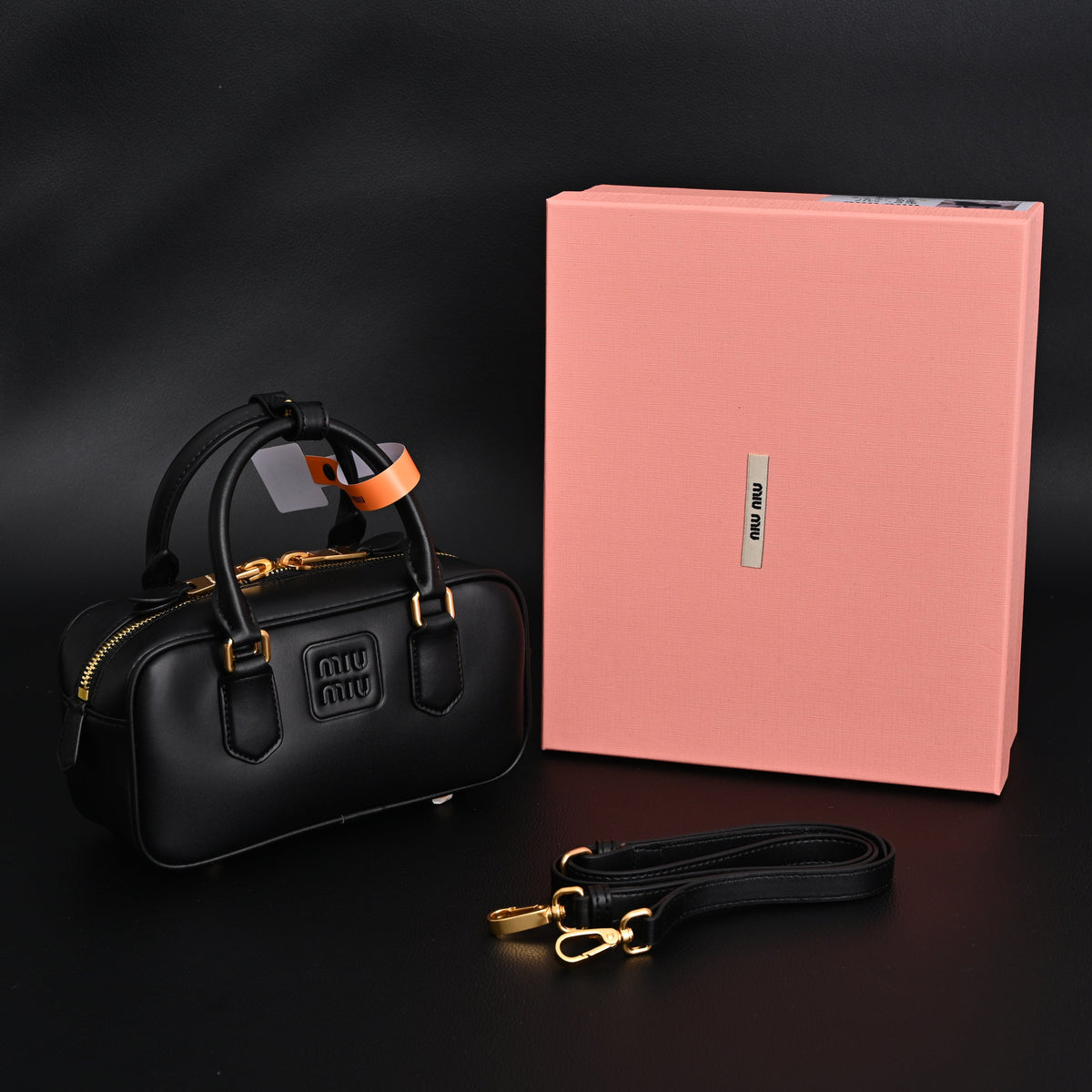 Miu Miu Leather Top Handle Satchel – Classic Black Satchel Bag product image 1, provided for visual reference and product
