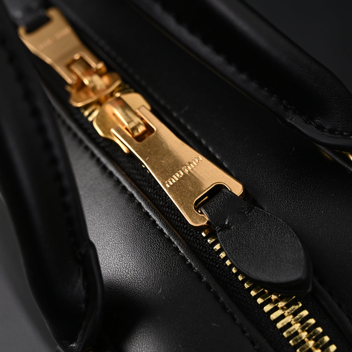 Miu Miu Leather Top Handle Satchel – Classic Black Satchel Bag product image 19, provided for visual reference and product