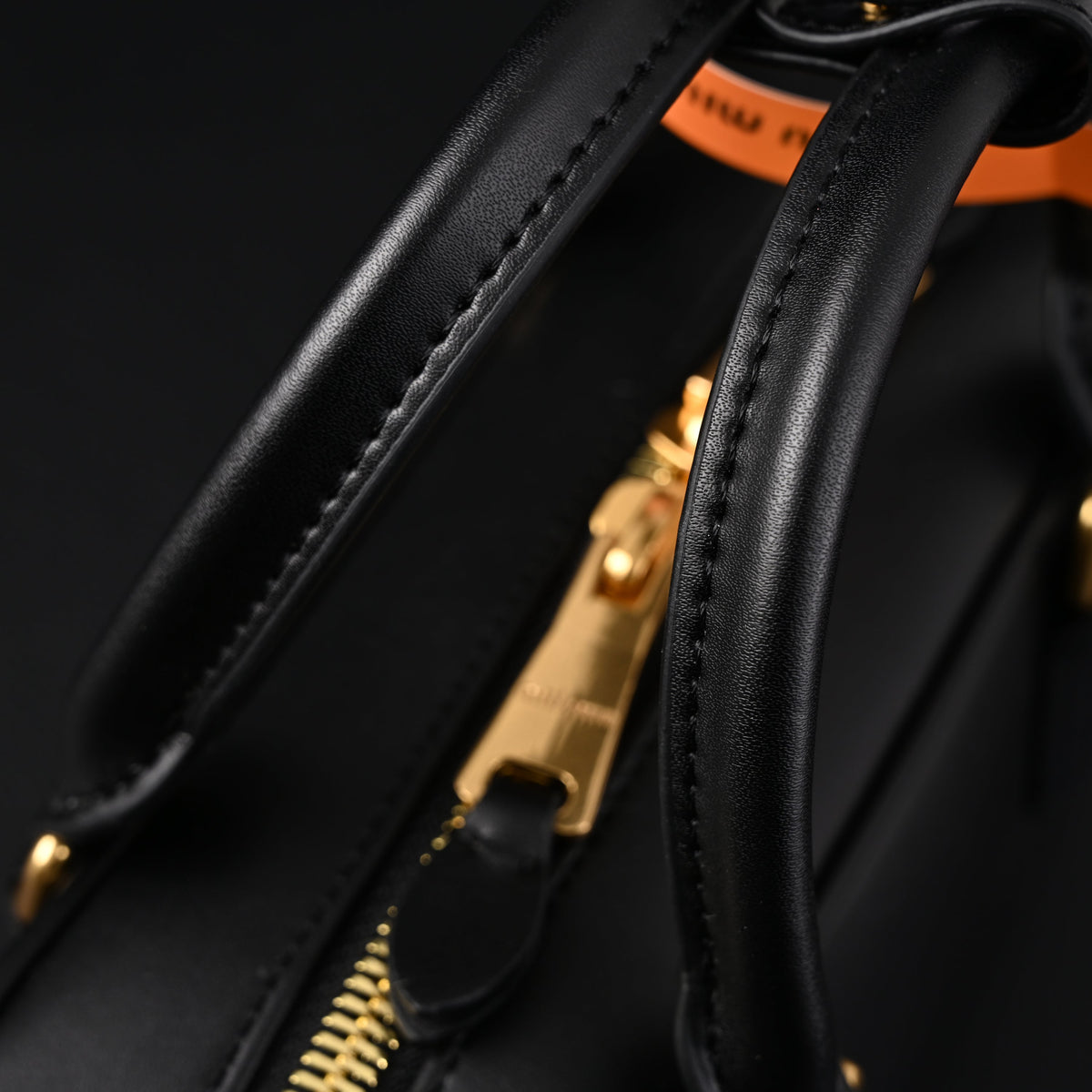 Miu Miu Black Matelassé Leather Satchel Bag – Mini Top Handle - Black with Gold-Tone Accents product image 2, provided for