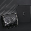 Saint Laurent Niki Medium Black Crinkled Leather Shoulder Bag product image 1, provided for visual reference and product