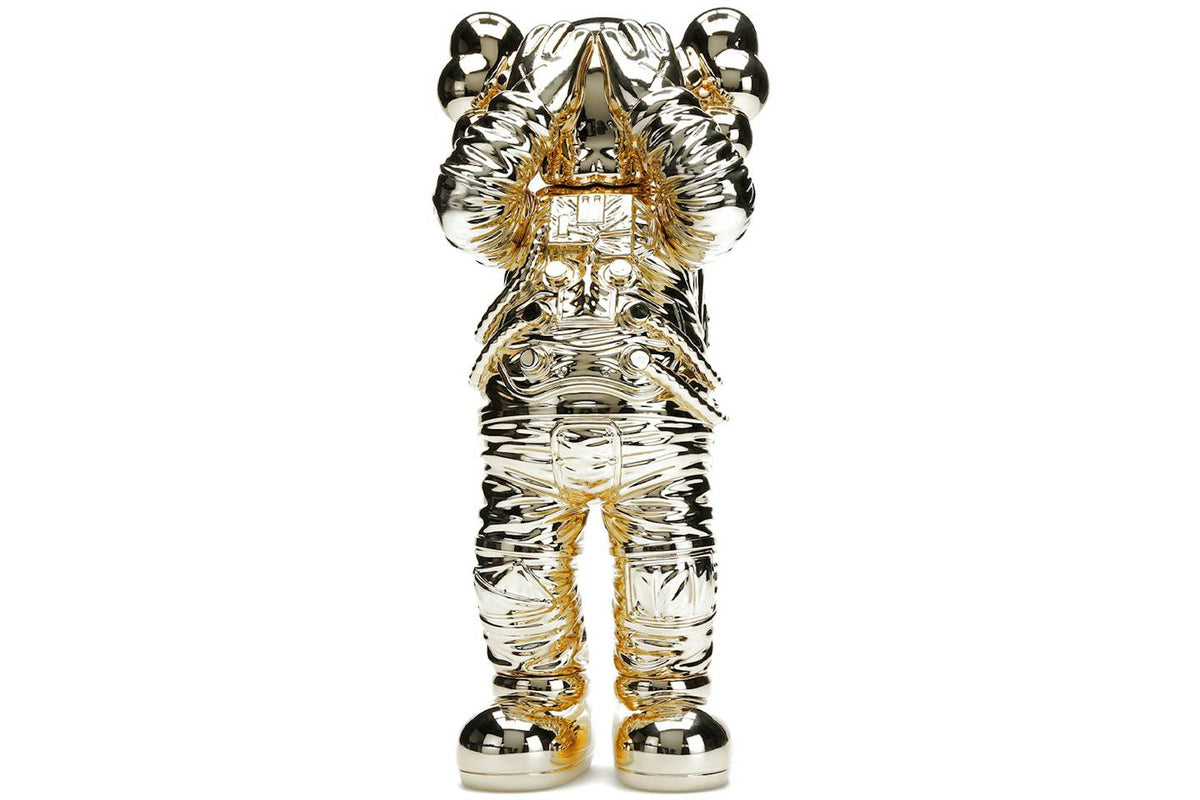 KAWS Holiday Space Figure - Gold product image 1, provided for visual reference and product detail review