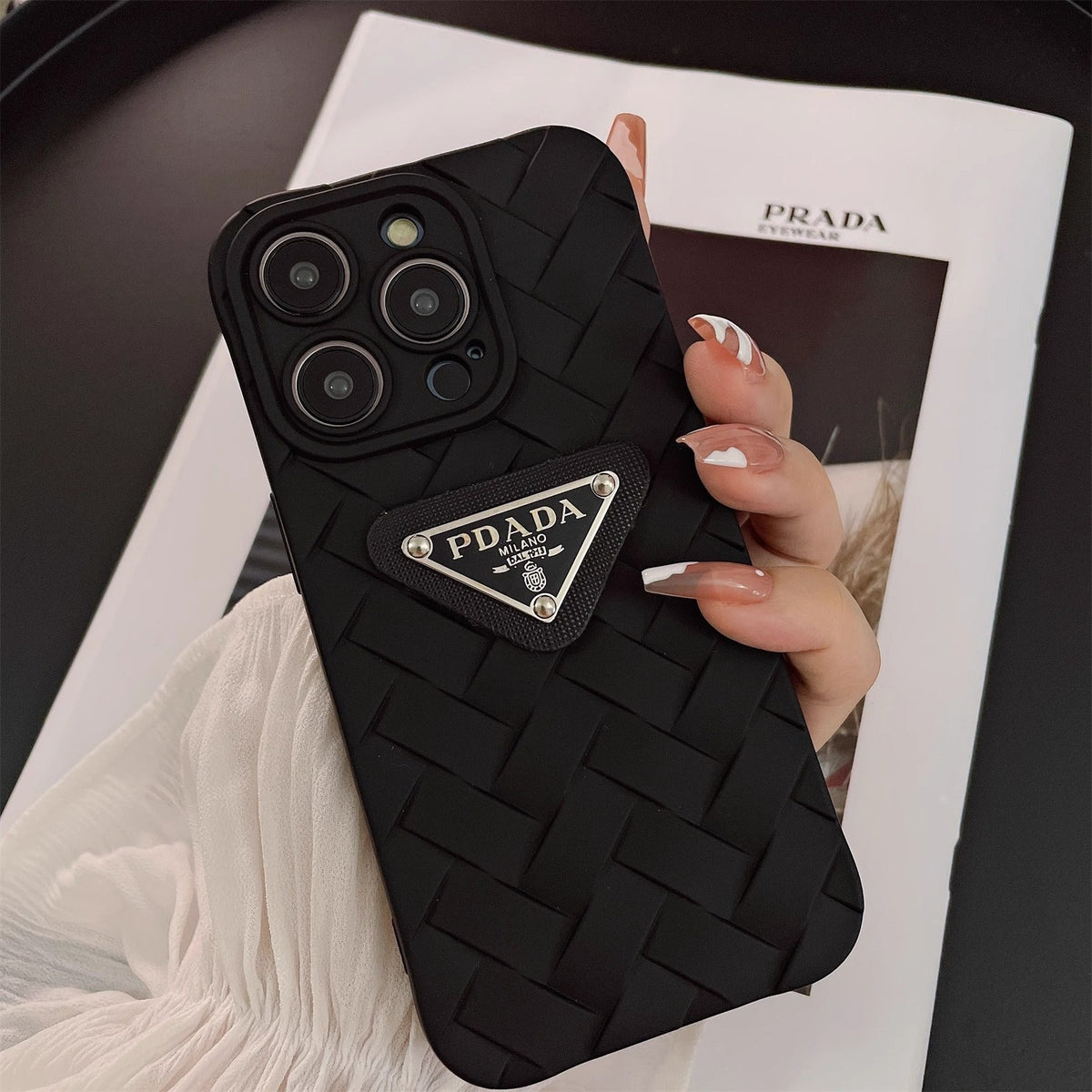 Prada Black Ribne Weave iPhone Case product image 1, provided for visual reference and product detail review