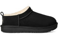 UGG Classic Micro Slipper - Black (Kids) product image 1, provided for visual reference and product detail review