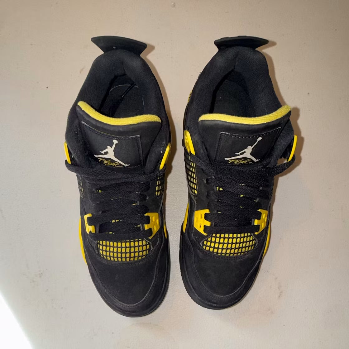 Air Jordan 4 Retro Thunder (2023) (GS) product image 2, provided for visual reference and product detail review