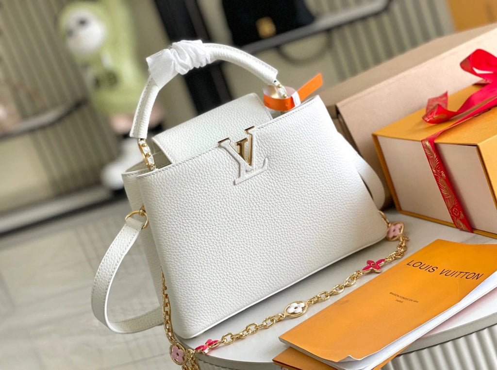 LV Capucines MM Taurillon Leather Handle Shoulder Bag with White Flower Strap product image 1, provided for visual reference