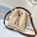 Louis Vuitton Néonoé BB Bucket Bag - Cosmic Latte product image 1, provided for visual reference and product detail review