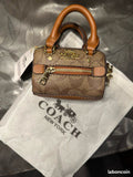 Coach Mini Rowan Charm Bag product image 1, provided for visual reference and product detail review