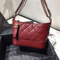 Chanel's Gabrielle Hobo Bag - Orange product image 1, provided for visual reference and product detail review