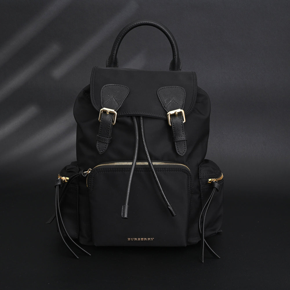 Burberry the Rucksack – Black Nylon & Leather Backpack with Gold-Tone Hardware - Black with Gold Accents