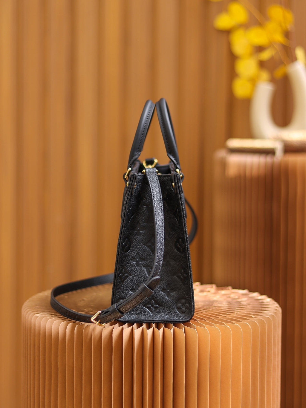 LV OnTheGo PM Monogram Empreinte Leather Tote Handle Bag with Black Leather Trim product image 6, provided for visual