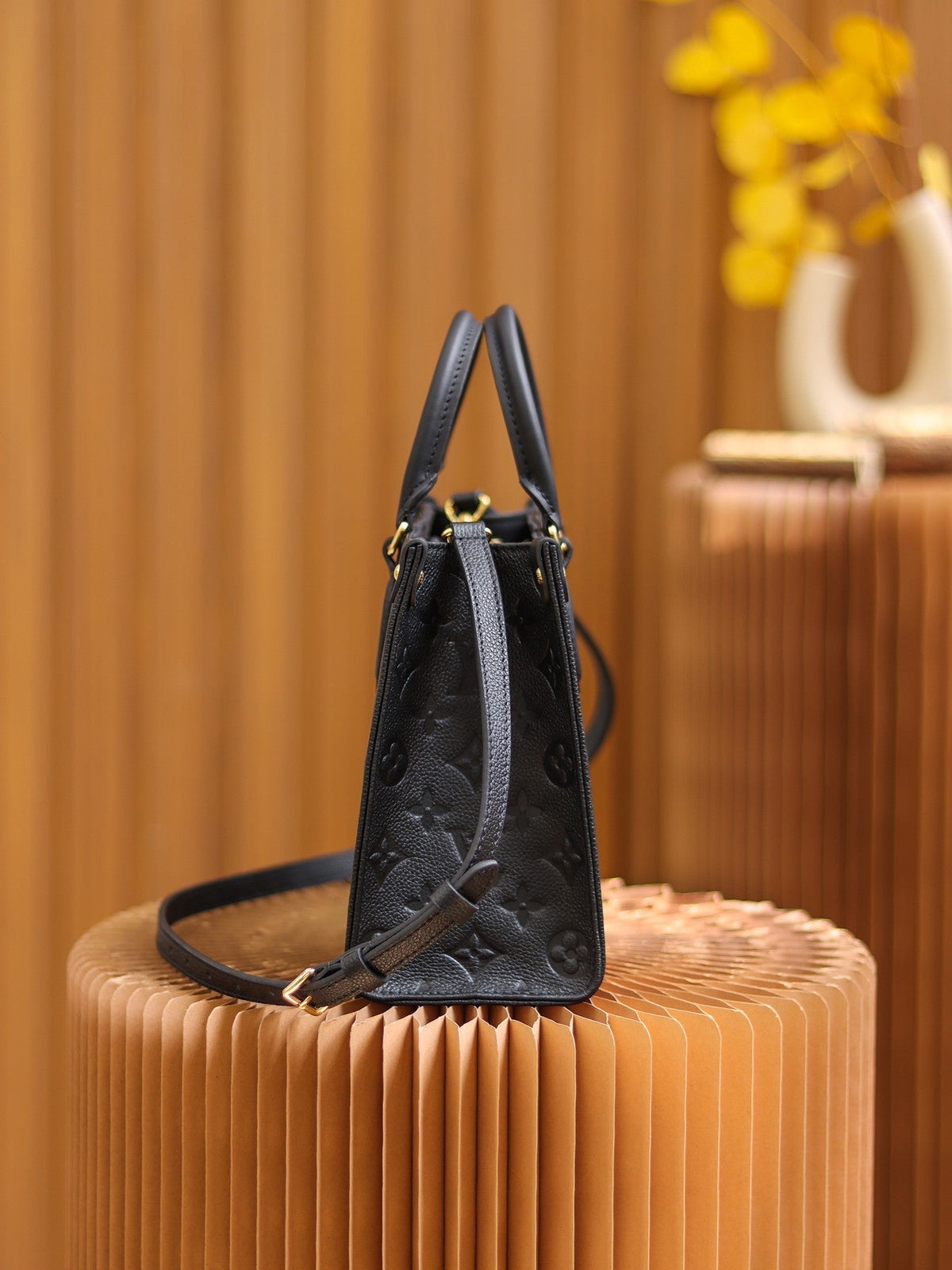 LV OnTheGo PM Monogram Empreinte Leather Tote Handle Bag with Black Leather Trim product image 6, provided for visual