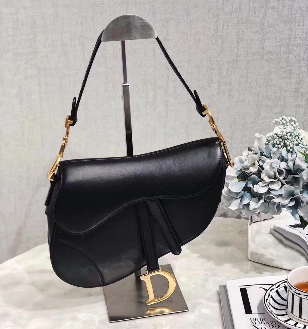 Dior Vintage Black Leather Saddle Bag with Gold Ornaments product image 2, provided for visual reference and product detail