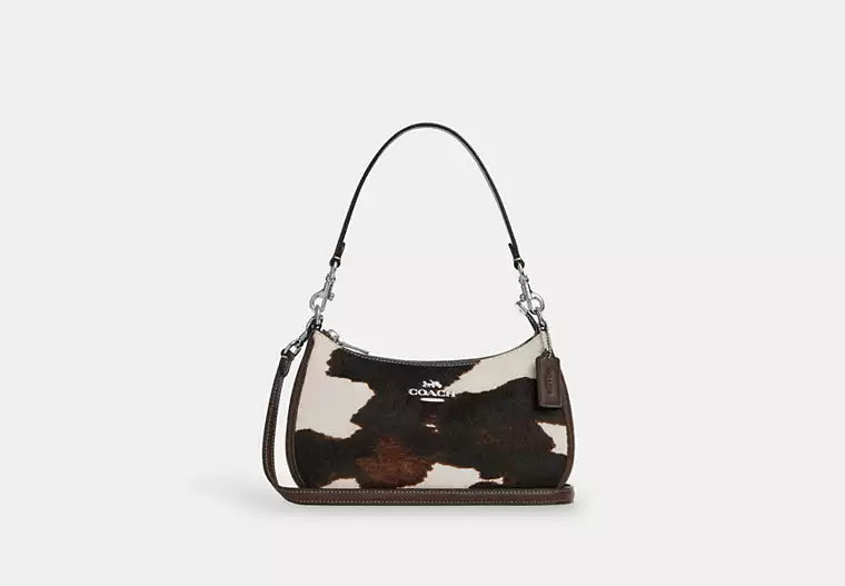 Teri Shoulder Bag with Cow Print product image 1, provided for visual reference and product detail review