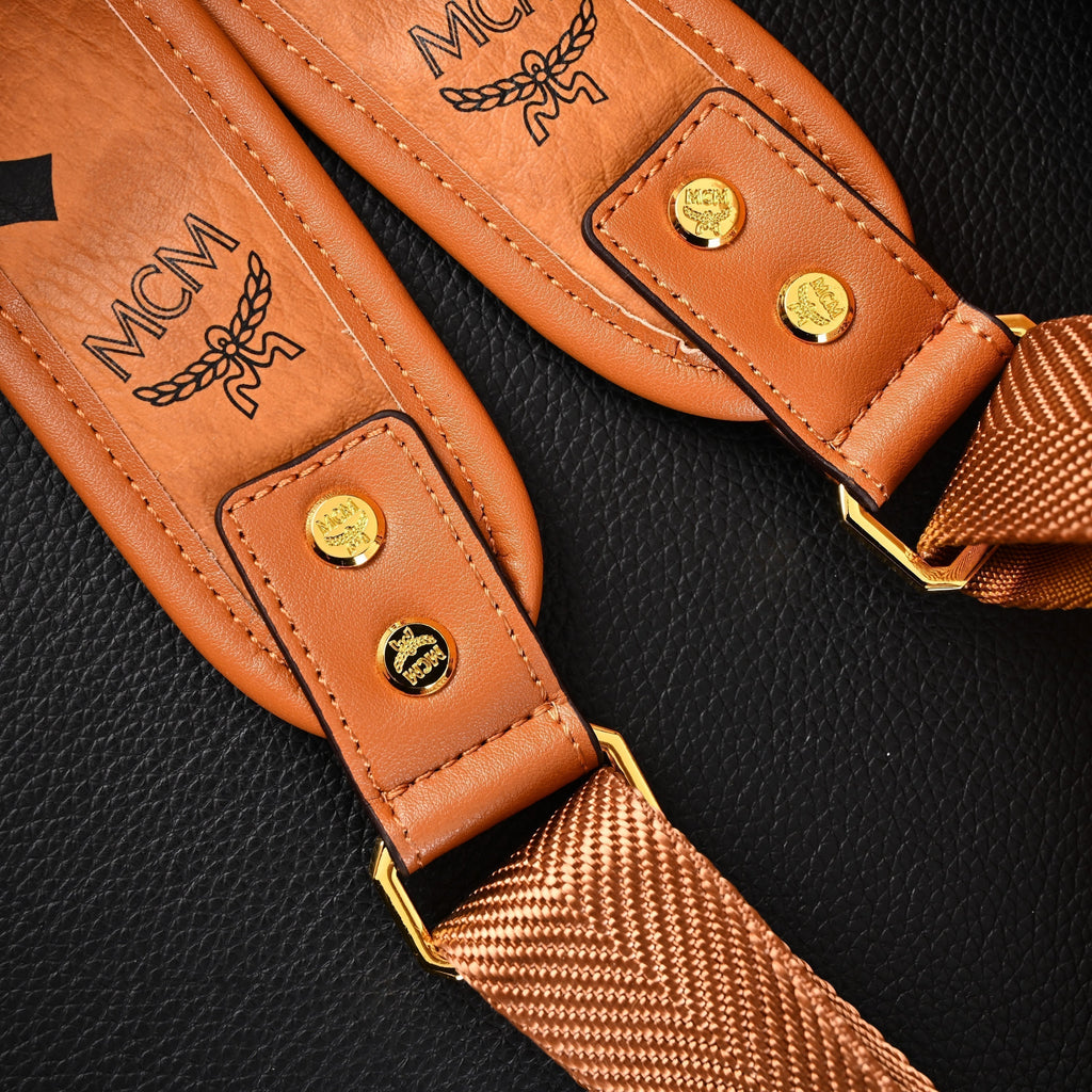 Mcm Stark Visetos Medium Backpack – Cognac Monogram with Gold-Tone Studs - Cognac with Black Monogram Print product image