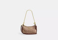 Teri Mini Crossbody Bag in Signature Canvas - Tan/Brown product image 1, provided for visual reference and product detail