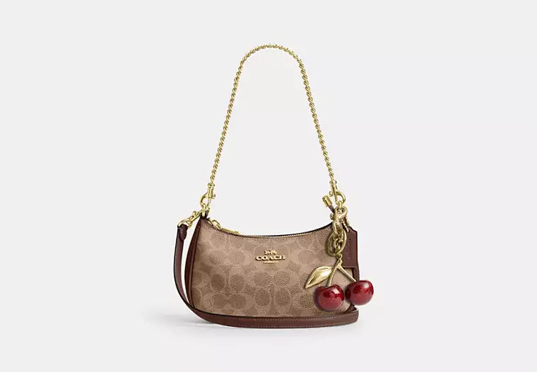 Teri Mini Crossbody Bag in Signature Canvas - Tan/Brown product image 2, provided for visual reference and product detail