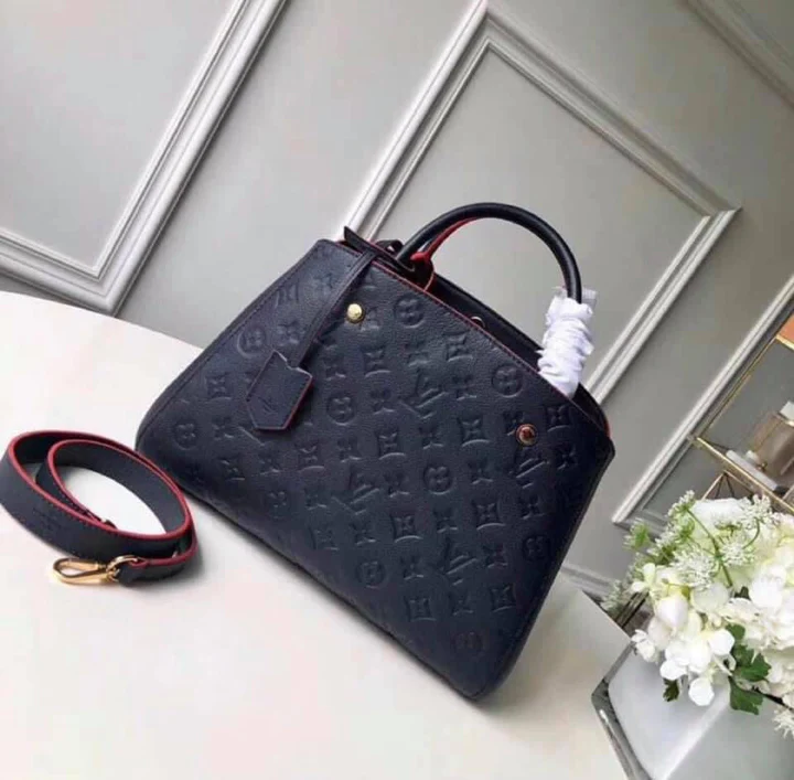 LV Montaigne MM Monogram Empreinte Leather Handle Shoulder Bag with Navy Blue Leather Trim and Shoulder Strap product image