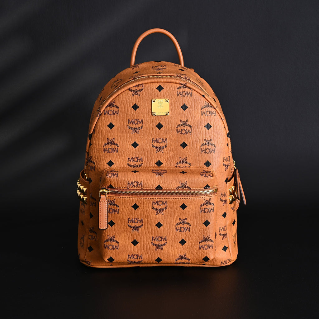 Mcm Stark Visetos Medium Backpack – Cognac Monogram with Gold-Tone Studs - Cognac with Black Monogram Print product image 1,