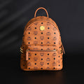 Mcm Stark Visetos Medium Backpack – Cognac Monogram with Gold-Tone Studs - Cognac with Black Monogram Print product image 1,