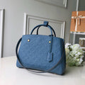Louis Vuitton Montaigne MM Blue Handbag product image 1, provided for visual reference and product detail review