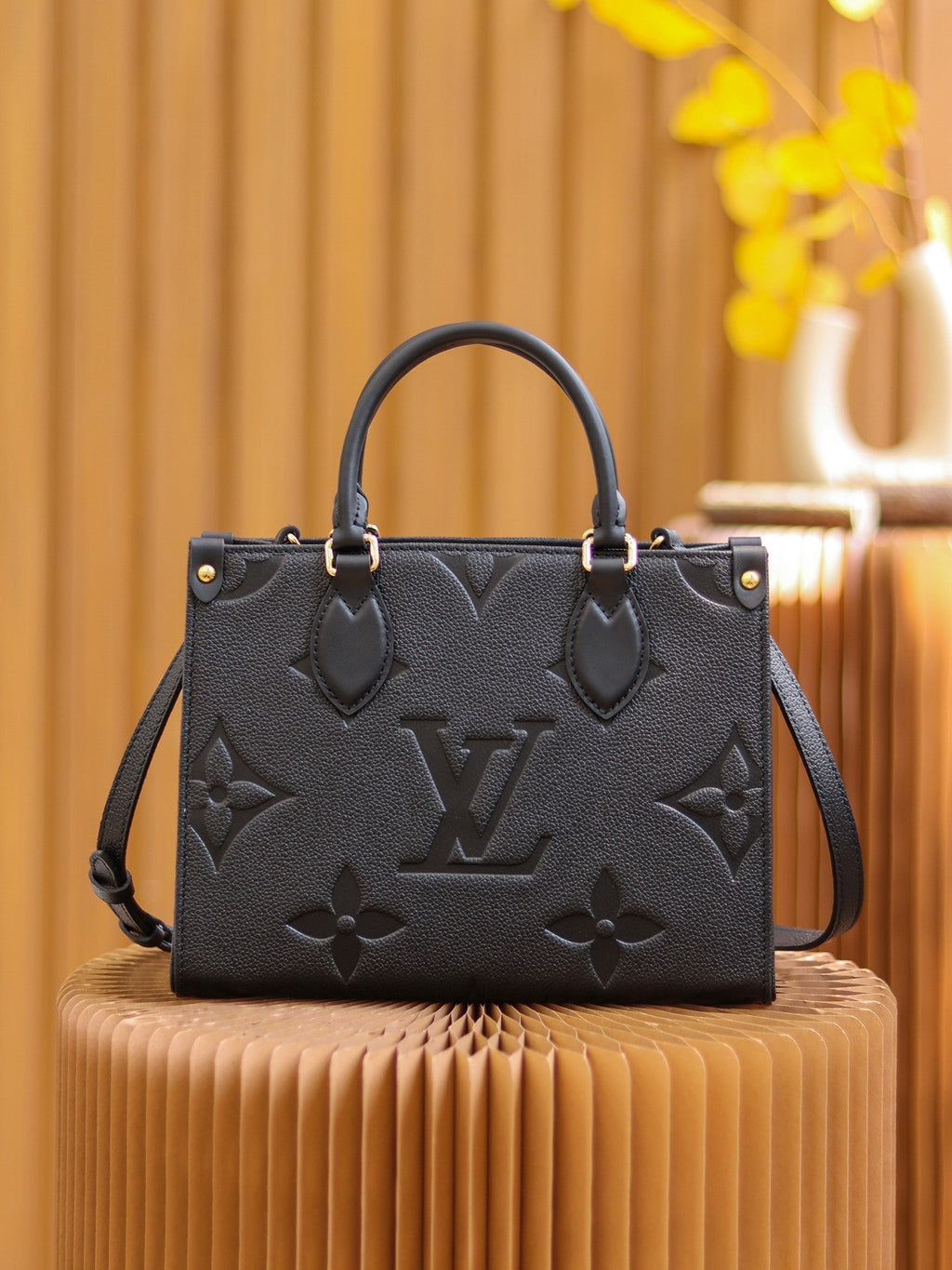 LV OnTheGo PM Monogram Empreinte Leather Tote Handle Bag with Black Leather Trim product image 8, provided for visual