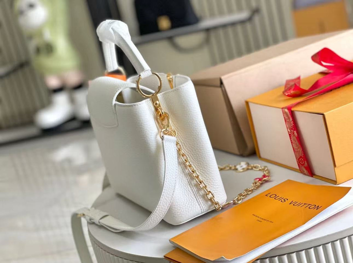 LV Capucines MM Taurillon Leather Handle Shoulder Bag with White Flower Strap product image 4, provided for visual reference