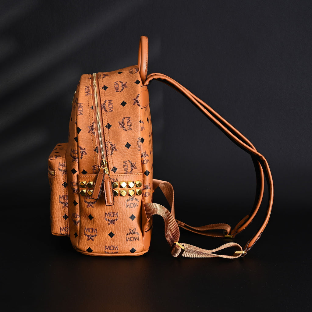 Mcm Stark Visetos Medium Backpack – Cognac Monogram with Gold-Tone Studs - Cognac with Black Monogram Print product image 6,