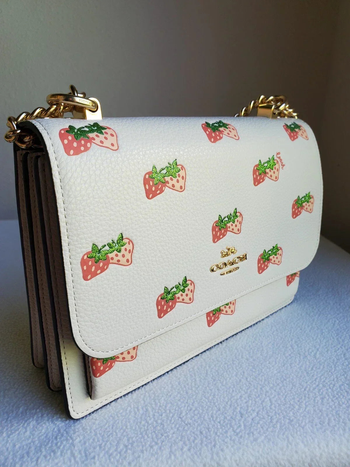 Coach Klare Crossbody with Strawberry Print - White product image 1, provided for visual reference and product detail review