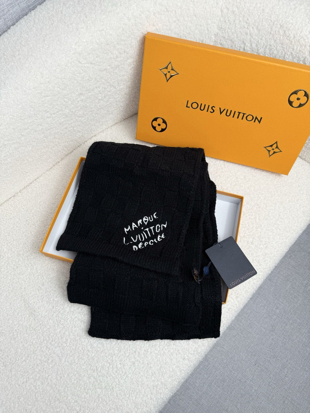 Louis Vuitton Black Logo Knit Scarf product image 1, provided for visual reference and product detail review