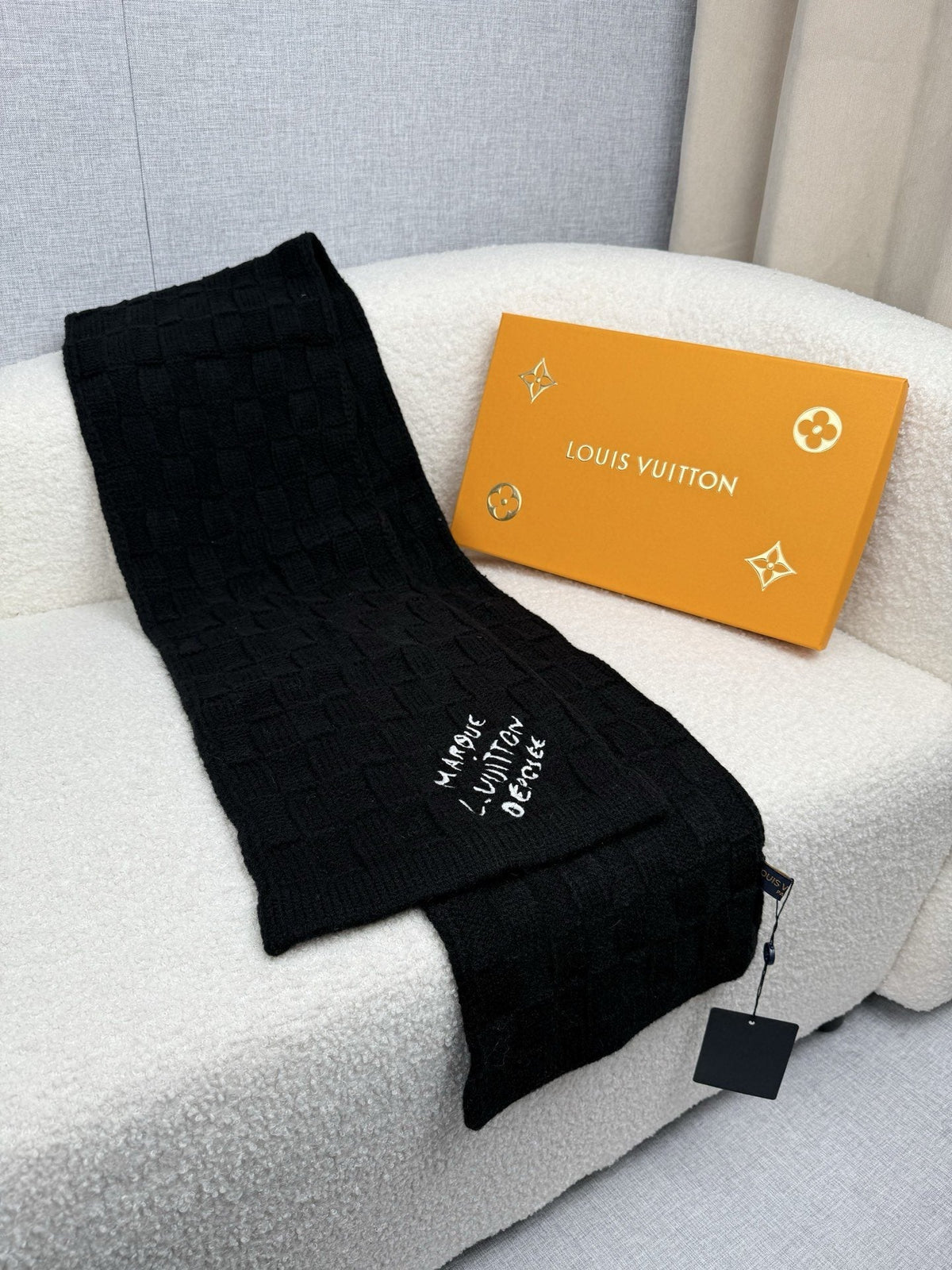 Louis Vuitton Black Knit Scarf product image 1, provided for visual reference and product detail review