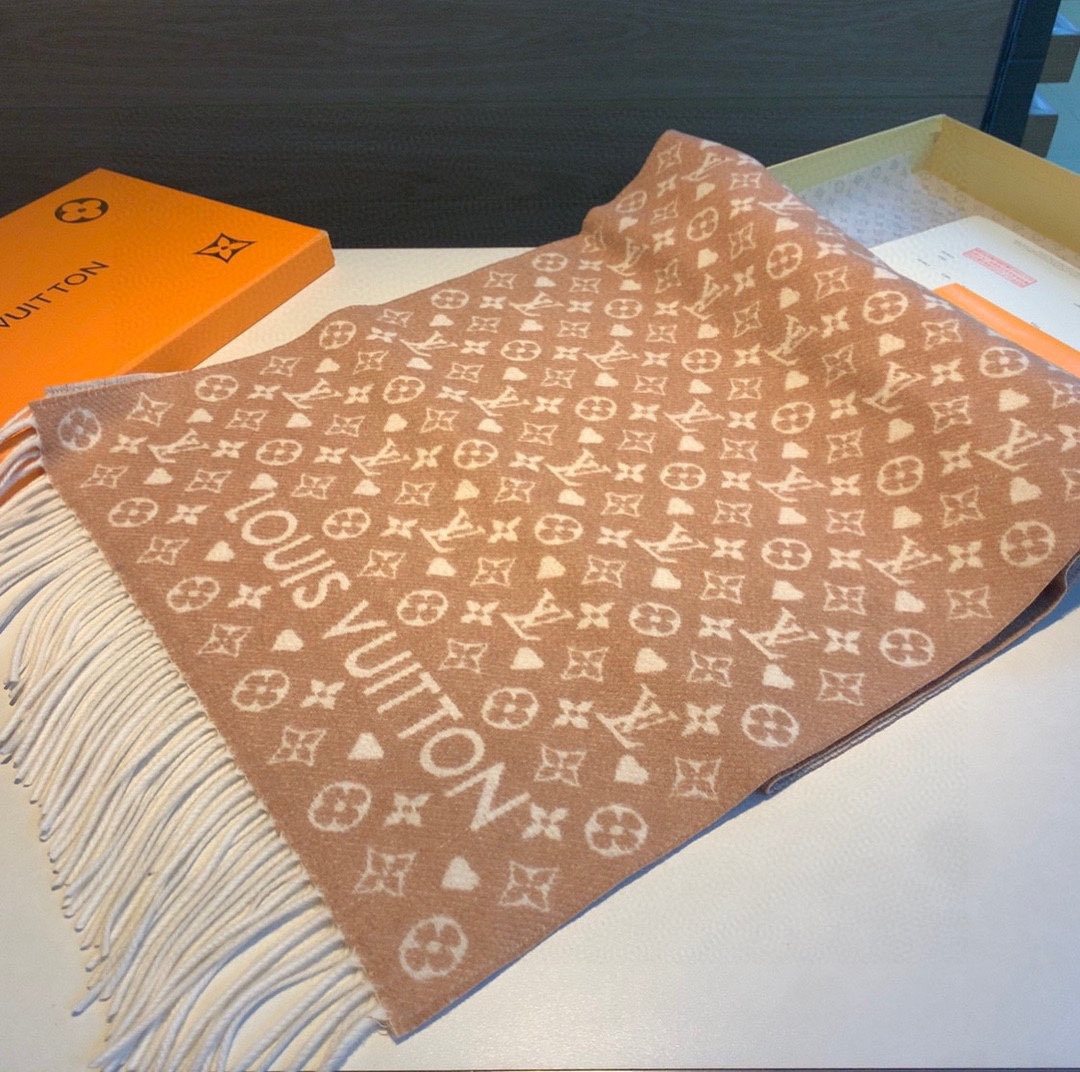 Louis Vuitton Tan and Cream Fringe Scarf product image 1, provided for visual reference and product detail review