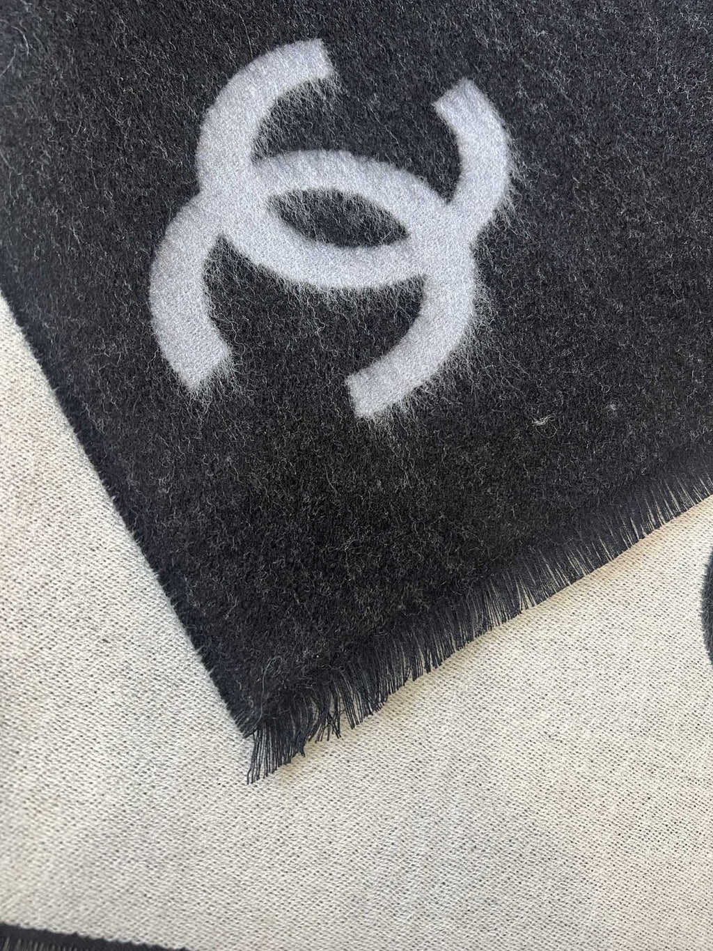 Chanel Reversible Black & Ivory Motif Shawl product image 9, provided for visual reference and product detail review