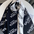 Balenciaga Black & White Knitted Scarf product image 1, provided for visual reference and product detail review