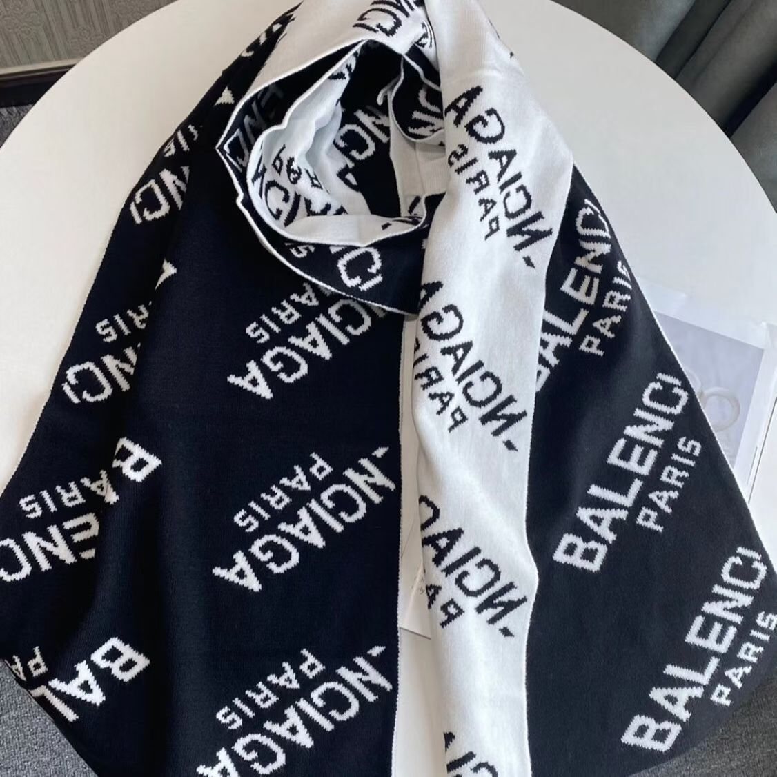 Balenciaga Black & White Knitted Scarf product image 1, provided for visual reference and product detail review