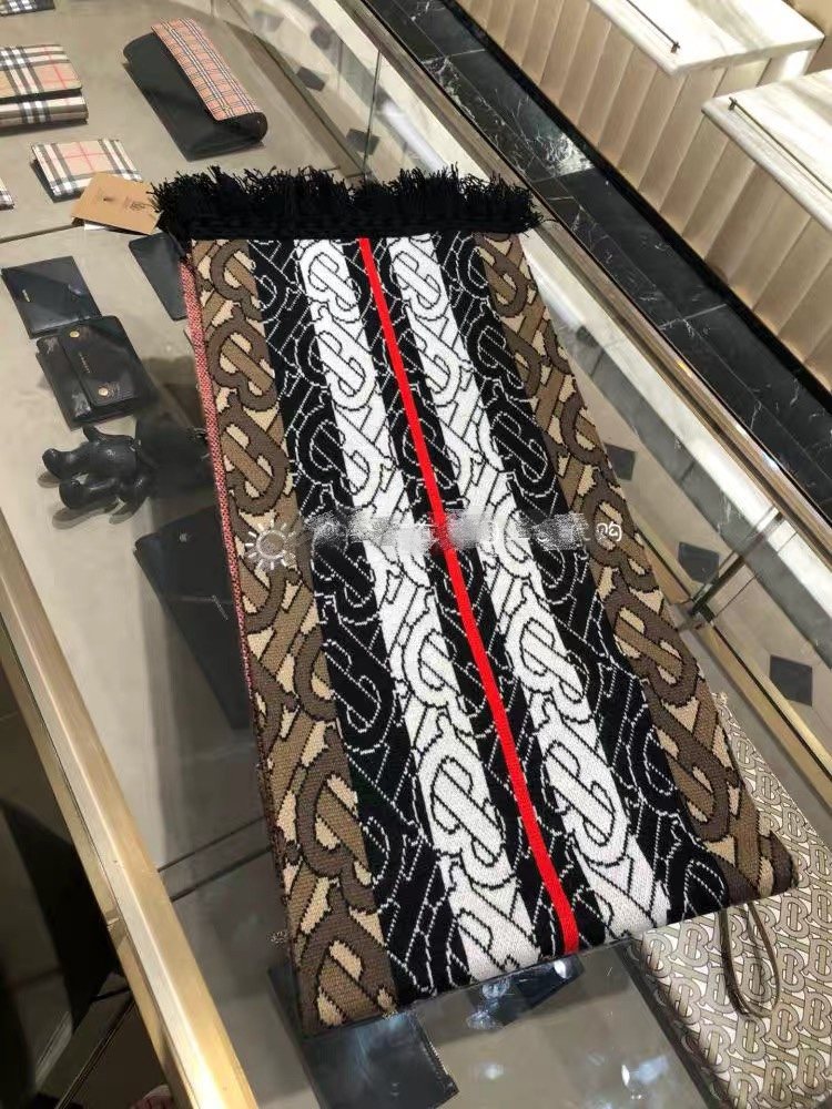 Burberry Patterned Fringed Scarf product image 1, provided for visual reference and product detail review