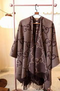 Gucci Fringed Monogram Cape product image 1, provided for visual reference and product detail review