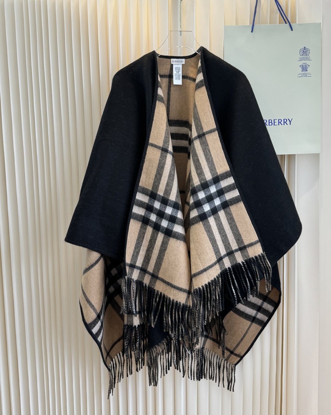 Black and Beige Plaid Fringed Poncho product image 1, provided for visual reference and product detail review