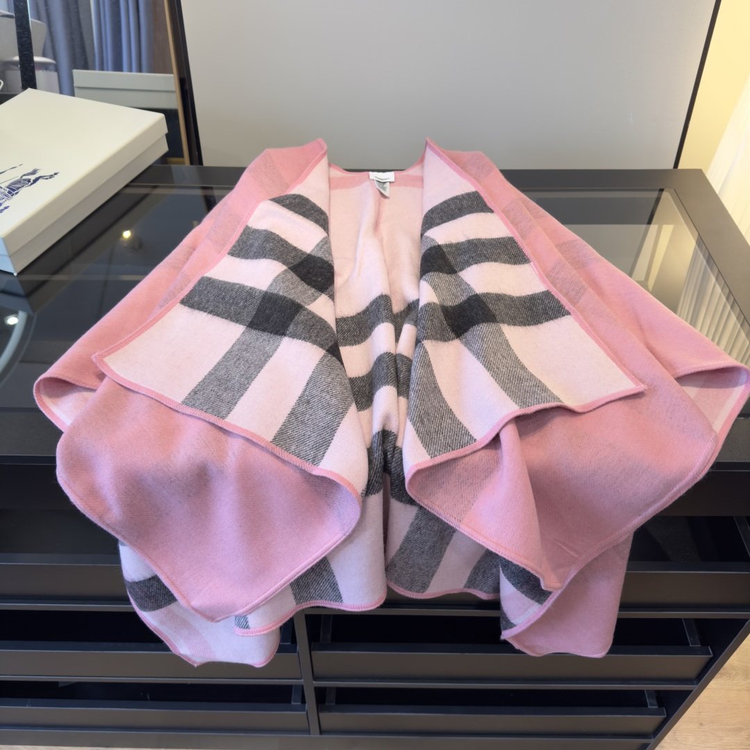 Burberry Reversible Plaid Cape Wrap product image 1, provided for visual reference and product detail review