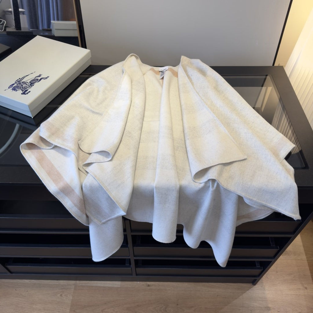Burberry Reversible Plaid Cape Wrap product image 11, provided for visual reference and product detail review
