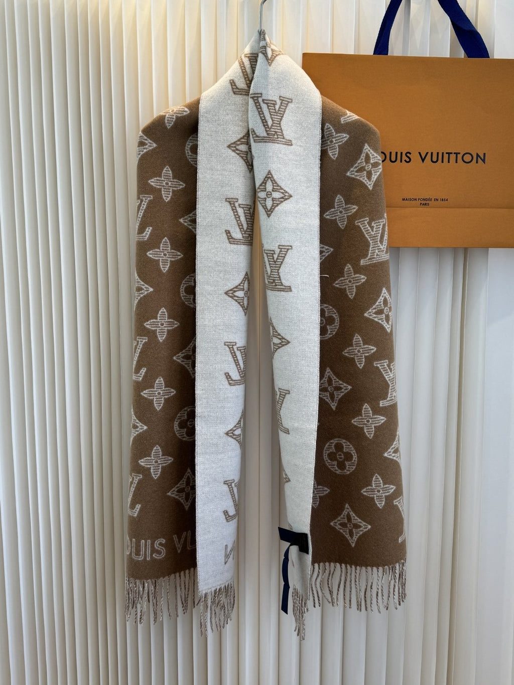 Louis Vuitton Reversible Monogram Knit Scarf product image 1, provided for visual reference and product detail review