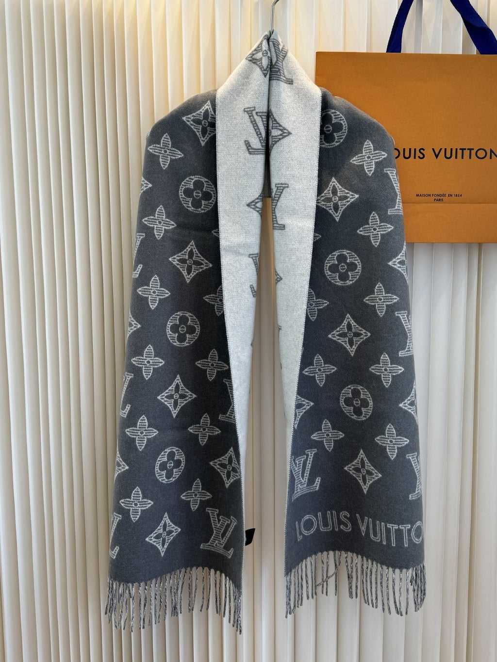 Louis Vuitton Reversible Monogram Knit Scarf product image 2, provided for visual reference and product detail review