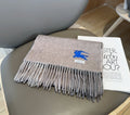 Burberry Reversible Plaid Fringed Scarf product image 1, provided for visual reference and product detail review