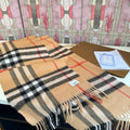Burberry Long Checked Wrap Scarf - 30 x 180 cm product image 1, provided for visual reference and product detail review
