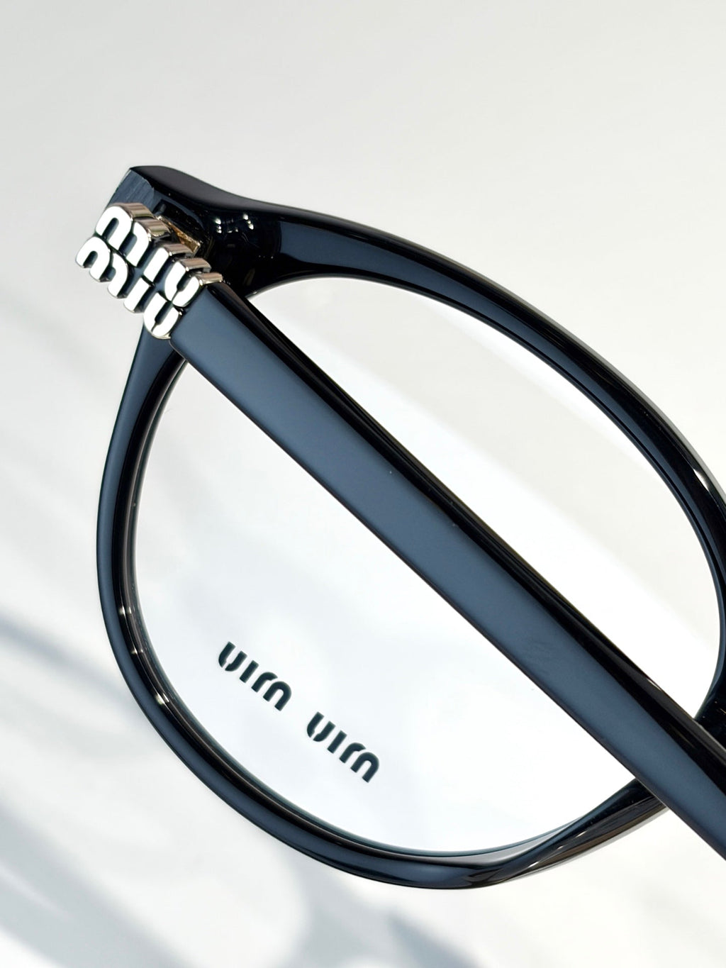 Miu Miu VMU 02WVF Sunglasses product image 6, provided for visual reference and product detail review